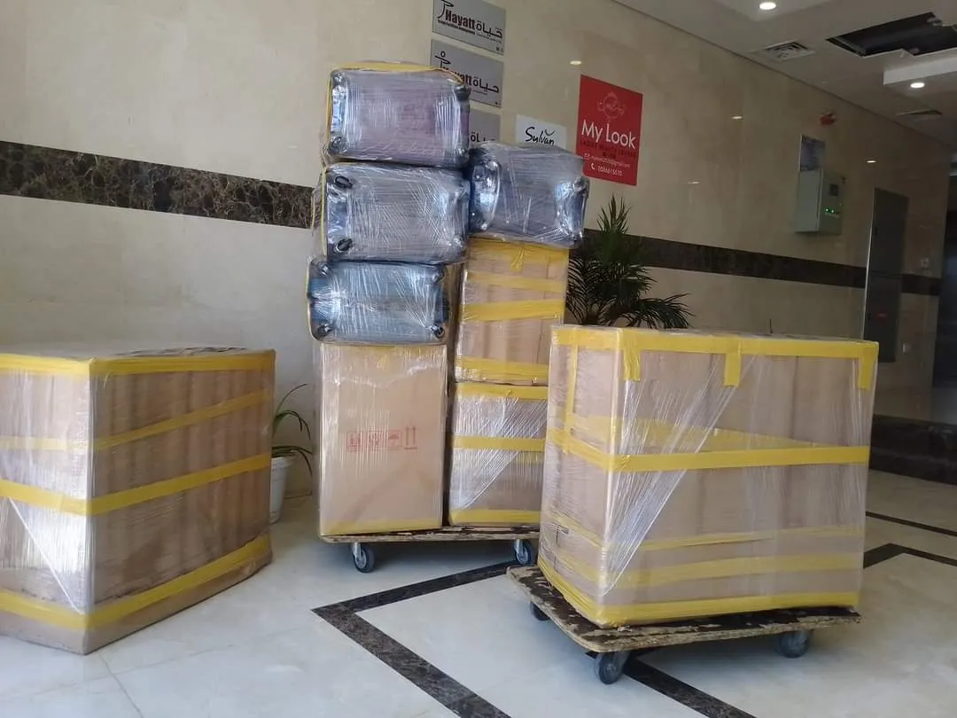 Professional movers and packers in Dubai loading furniture